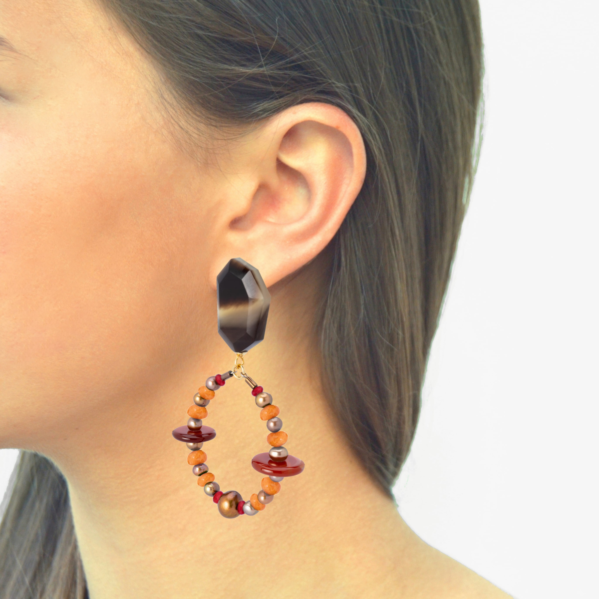 PENDIENTES LALA CON CUERNO Y PIEDRAS NARANJA